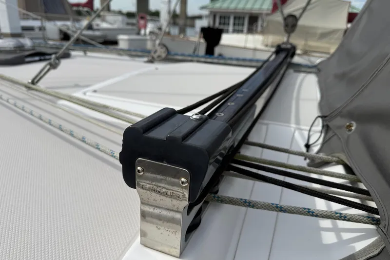 Slide: The Image of Close-up of Catalina 355 sailboat rigging, showcasing ropes and hardware, 2011 model. - 16