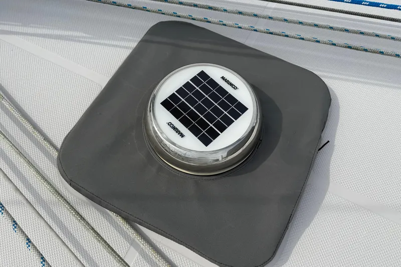 Slide: The Image of Solar-powered vent on 2011 Catalina 355 sailboat deck. - 20