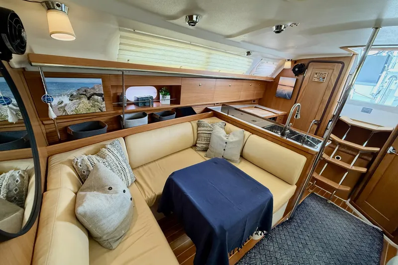 Slide: The Image of Luxurious interior of 2011 Catalina 355 yacht with cozy seating and modern kitchen. - 26