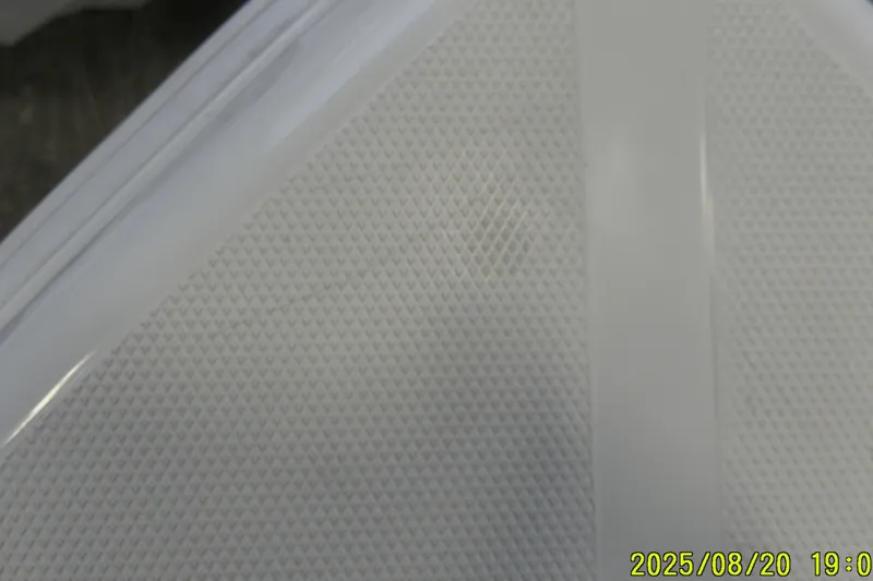 Slide: The Image of Close-up of textured surface on 2024 Ranger 2600 Bay boat. - 12