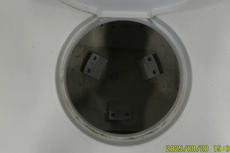 Slide: The Image of Open compartment of 2024 Ranger 2600 Bay boat, showing interior details. - 19