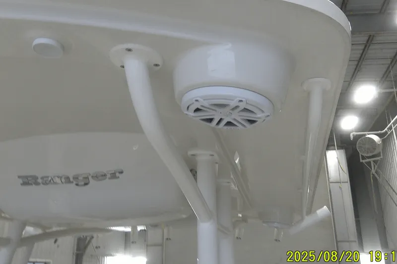 Slide: The Image of 2024 Ranger 2600 Bay boat interior with speaker and support structures. - 28