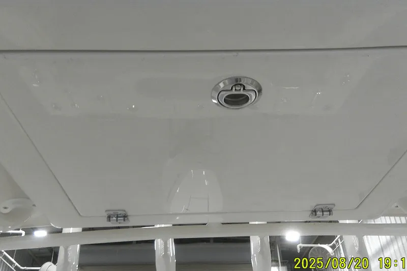 Slide: The Image of 2024 Ranger 2600 Bay boat hatch with latch, viewed from below. - 32