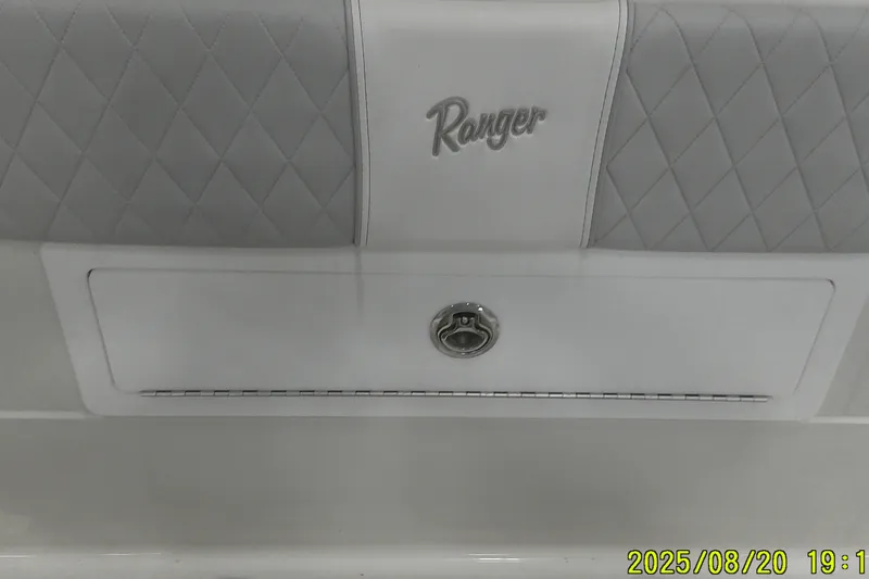 Slide: The Image of Ranger 2600 Bay 2024 boat seat with quilted design and logo. - 44