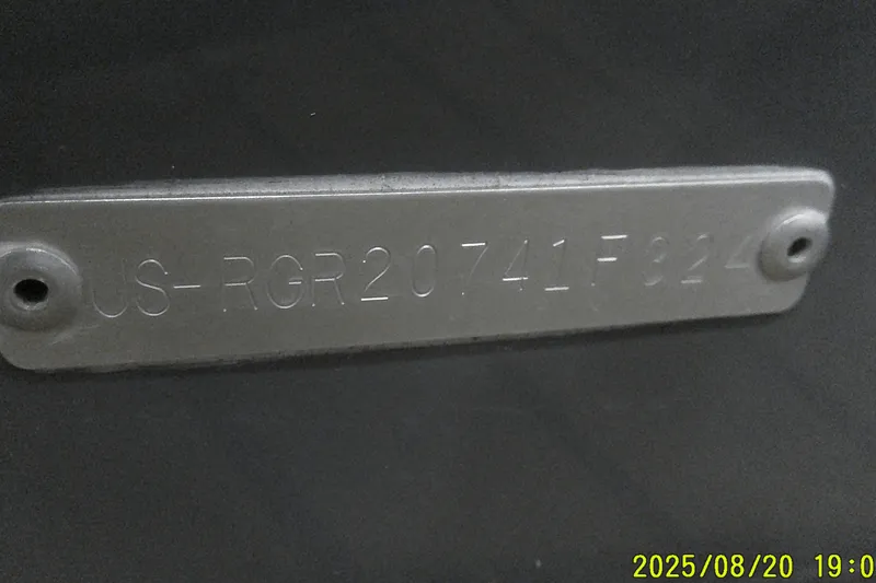 Slide: The Image of Metal identification plate on 2024 Ranger 2600 Bay boat, displaying serial number. - 60