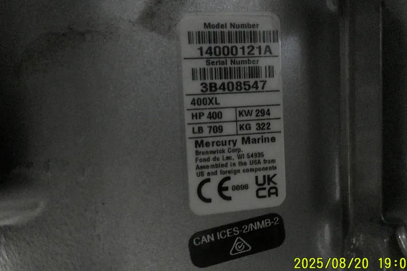 Slide: The Image of Label on Mercury Marine engine, model 400XL, with specifications and compliance symbols. - 61