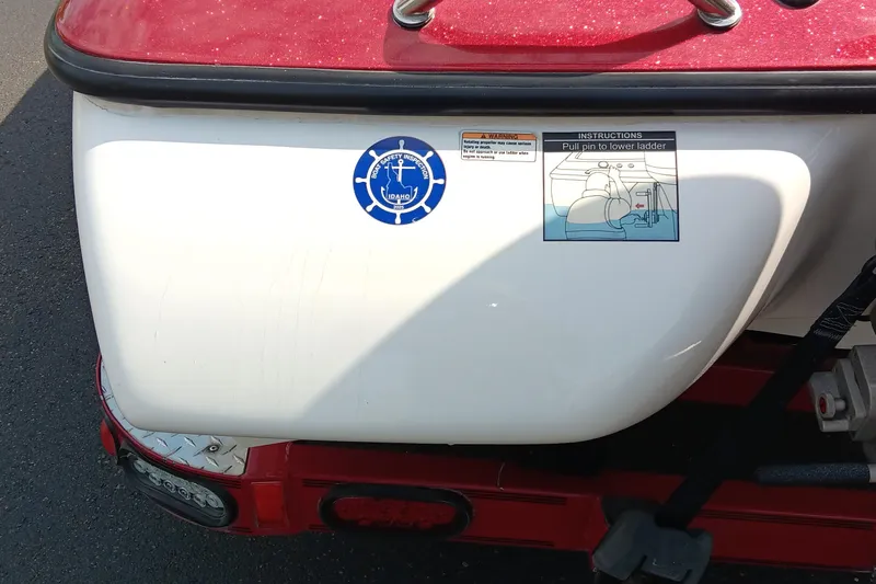 Slide: The Image of 2009 Skeeter ZX190 boat with safety inspection sticker and ladder instructions. - 11