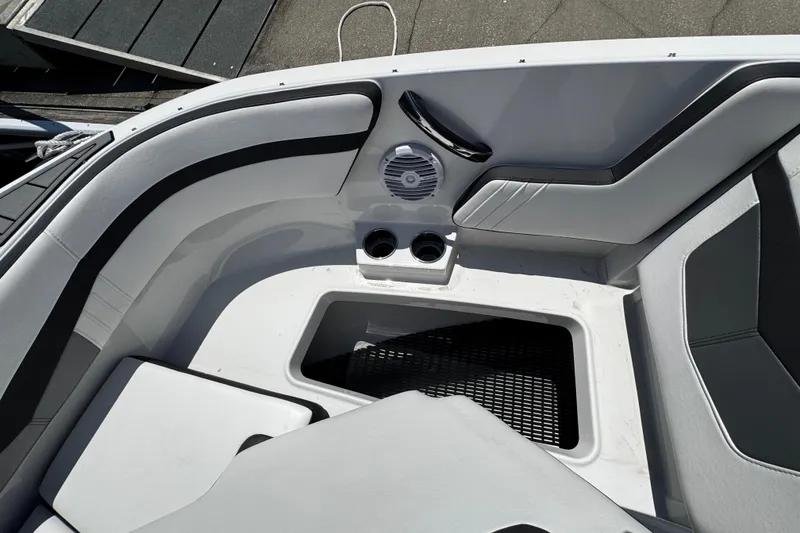 Slide: The Image of Interior of 2021 Monterey M225 boat with seating, speaker, and cup holders. - 30