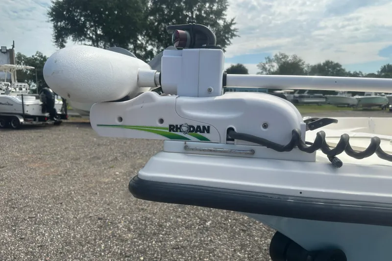 Slide: The Image of Rhodan trolling motor on 2003 Key West 196 Bay Reef boat, parked outdoors. - 10