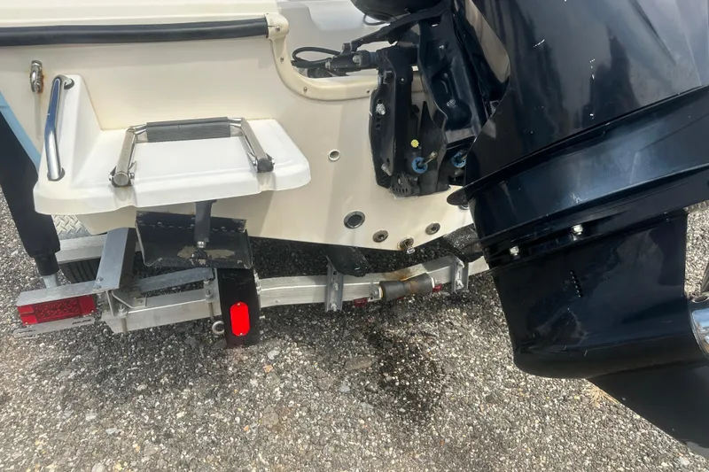 Slide: The Image of Rear view of a 2003 Key West 196 Bay Reef boat on a trailer. - 16