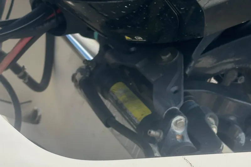 Slide: The Image of Close-up of a 2003 Key West 196 Bay Reef boat engine components. - 28