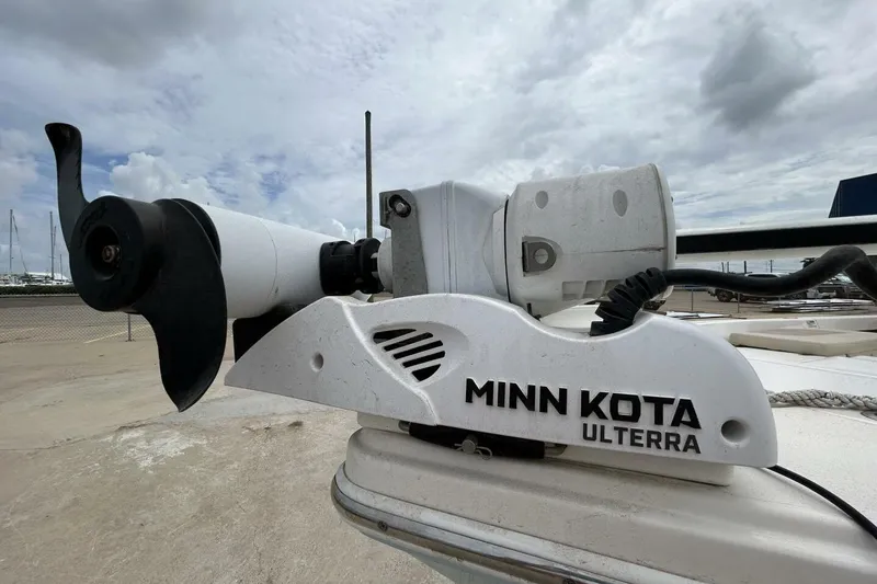Slide: The Image of Minn Kota Ulterra motor on 2021 Pathfinder 2400 TRS boat, dockside view. - 3