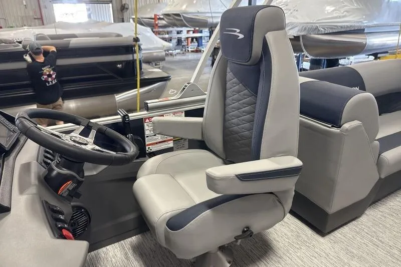 Slide: The Image of Captain's chair in 2026 Bennington 22 SSRSE pontoon boat interior. - 24