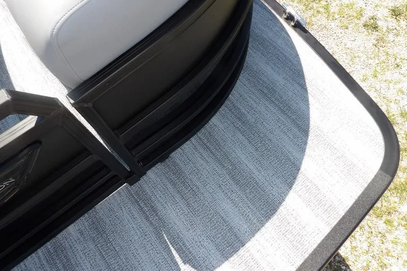 Slide: The Image of 2026 Bennington M Swingback 24 MSB boat deck with sleek design and modern seating. - 10