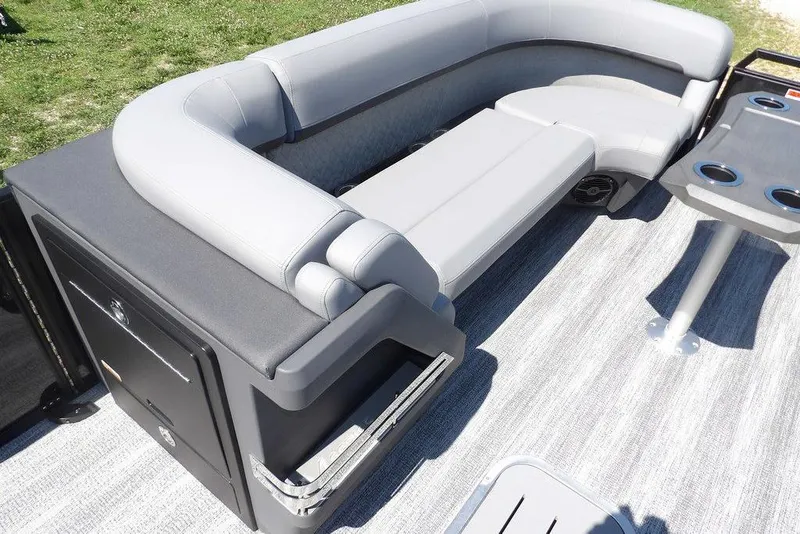 Slide: The Image of 2026 Bennington M Swingback 24 MSB pontoon boat with luxurious seating and cup holders. - 15