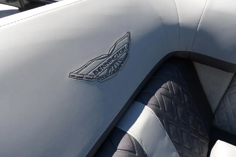 Slide: The Image of 2026 Bennington M Swingback 24 MSB boat seat with logo, featuring elegant stitching. - 16