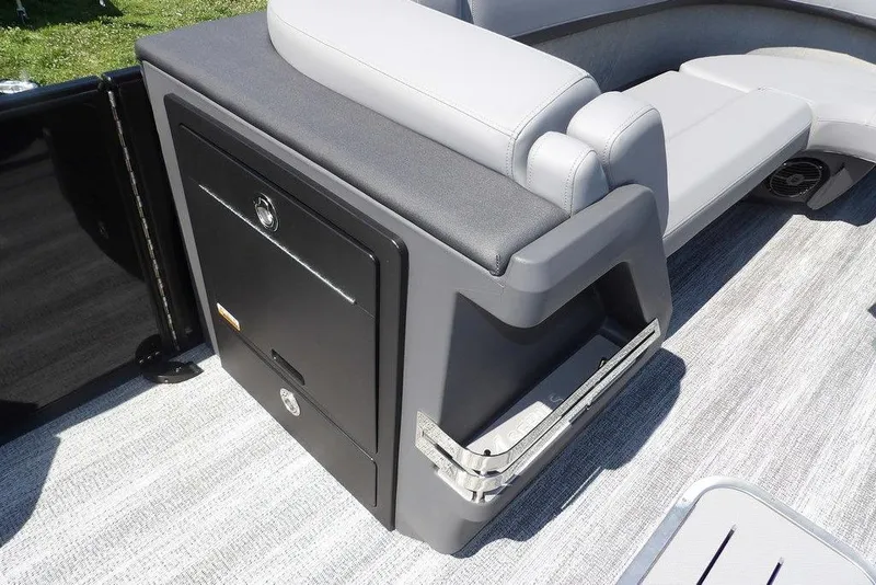 Slide: The Image of 2026 Bennington M Swingback 24 MSB boat interior with sleek seating and storage. - 21