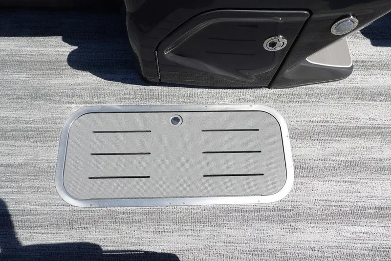 Slide: The Image of 2026 Bennington M Swingback 24 MSB boat floor hatch on textured surface. - 22