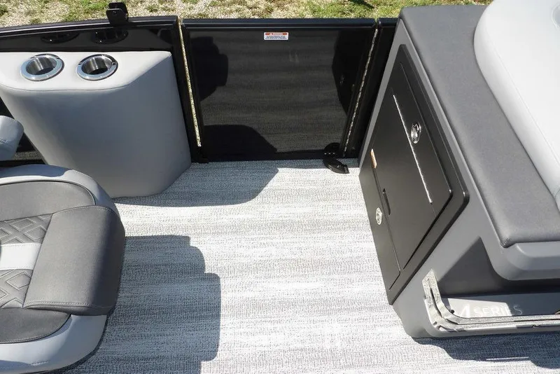 Slide: The Image of 2026 Bennington M Swingback 24 MSB interior with seating and storage features. - 24