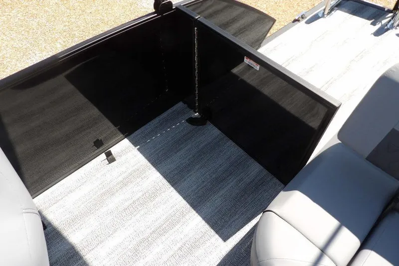 Slide: The Image of 2026 Bennington M Swingback 24 MSB interior with gray seating and flooring. - 39