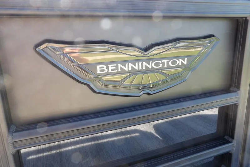 Slide: The Image of Bennington logo on 2026 M Swingback 24 MSB boat, close-up view. - 45