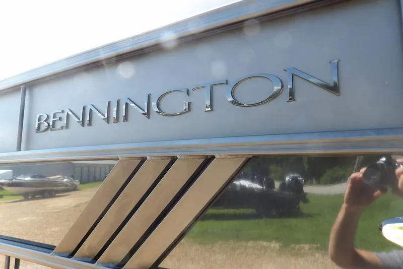 Slide: The Image of 2026 Bennington M Swingback 24 MSB logo on sleek metallic surface. - 47