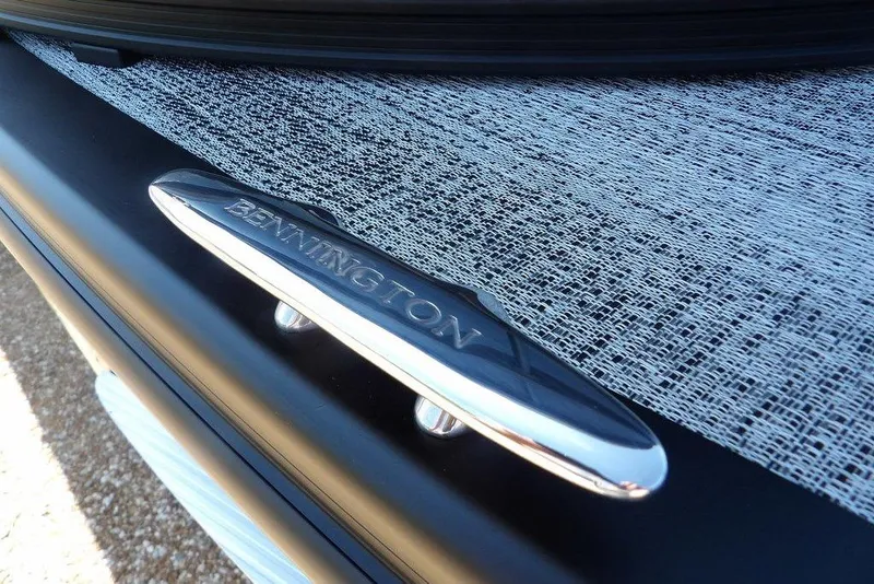 Slide: The Image of Close-up of 2026 Bennington M Swingback 24 MSB boat cleat on textured surface. - 49