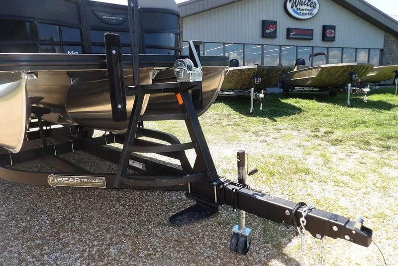 Slide: The Image of 2026 Bennington M Swingback 24 MSB on Bear trailer at marine center. - 51