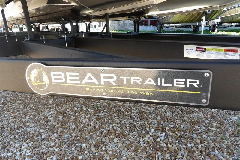 Slide: The Image of Bear Trailer logo on a Bennington M Swingback 24 MSB, 2026 model. - 52