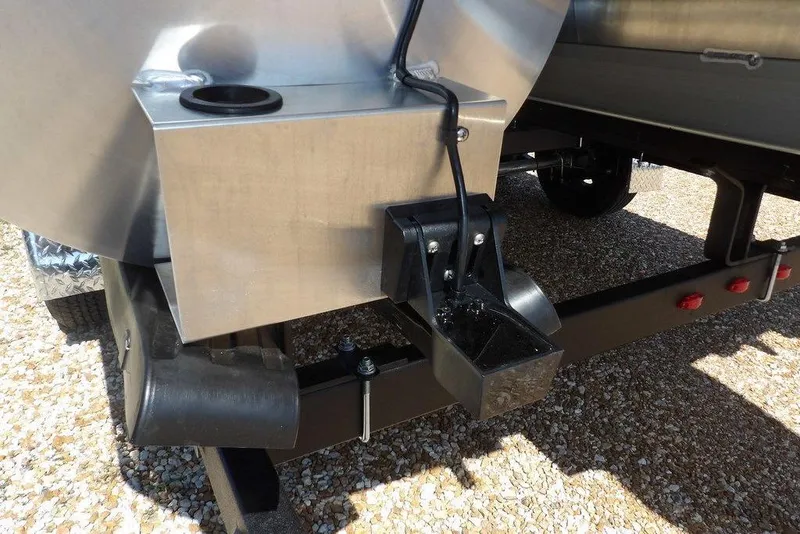 Slide: The Image of Close-up of 2026 Bennington M Swingback 24 MSB trailer hitch and components. - 62