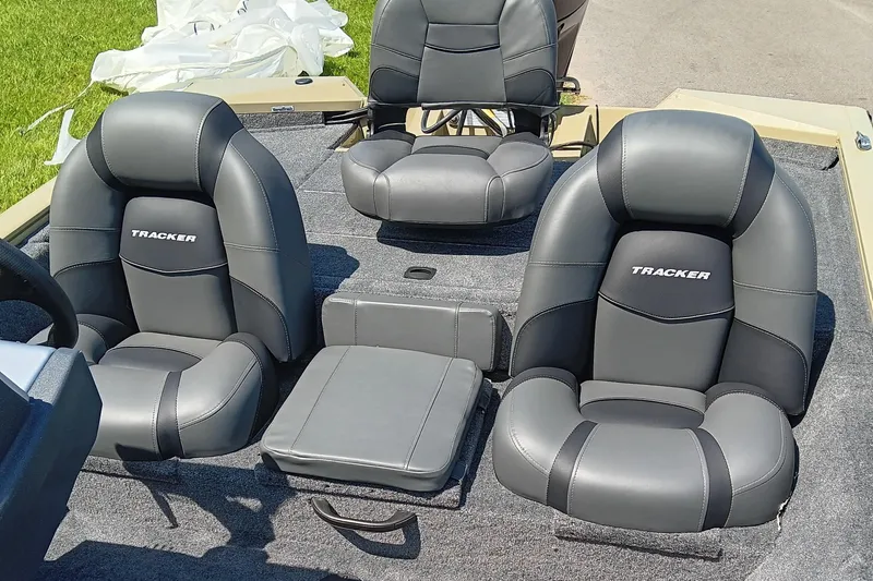 Slide: The Image of 2026 Tracker Pro Team 175 boat interior with gray cushioned seats. - 13