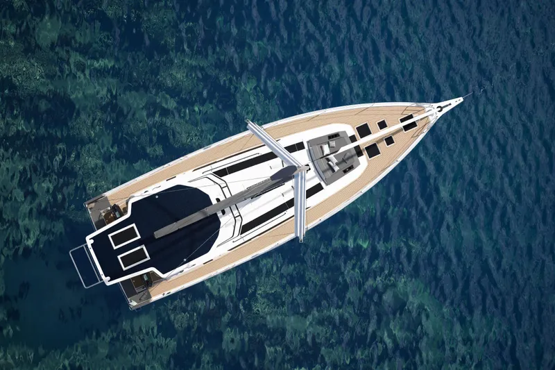 Slide: The Image of Aerial view of 2026 Dufour 54 yacht on clear blue water. - 2