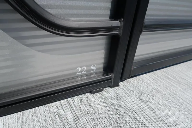Slide: The Image of 2026 Bennington S Quad Bench 22 SSR, close-up of exterior detail. - 13