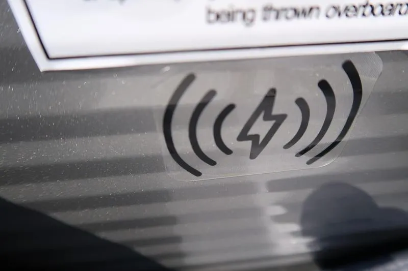 Slide: The Image of Wireless charging symbol on 2026 Bennington S Quad Bench 22 SSR boat. - 23