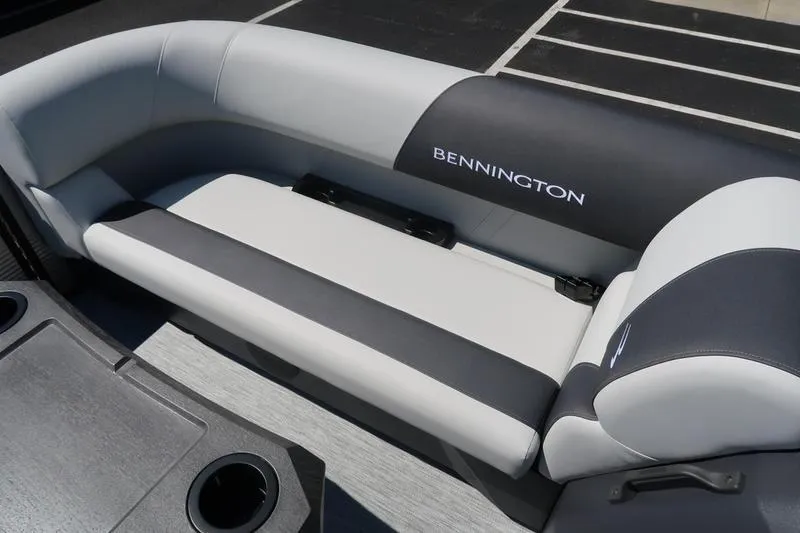 Slide: The Image of 2026 Bennington S Quad Bench 22 SSR boat seating, featuring sleek gray and black upholstery. - 24