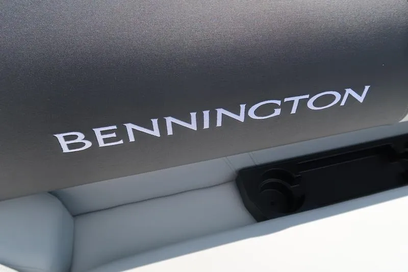 Slide: The Image of Close-up of 2026 Bennington S Quad Bench 22 SSR seat with logo. - 25