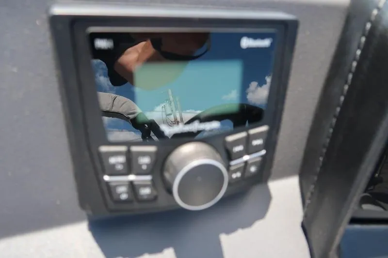 Slide: The Image of Close-up of a control panel on a 2026 Bennington S Quad Bench 22 SSR boat. - 29