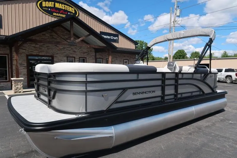 Slide: The Image of 2026 Bennington S Quad Bench 22 SSR pontoon boat at dealership. - 8