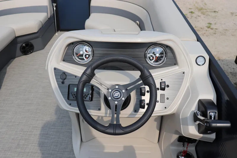 Slide: The Image of Steering console of 2025 Flagship Freedom 22 CU boat with modern controls. - 4