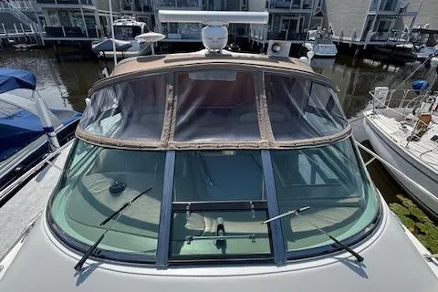 Slide: The Image of 2001 Sea Ray 340 Amberjack boat docked at marina, front view. - 18