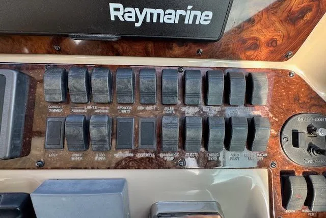 Slide: The Image of Control panel of a 2001 Sea Ray 340 Amberjack with Raymarine equipment. - 23