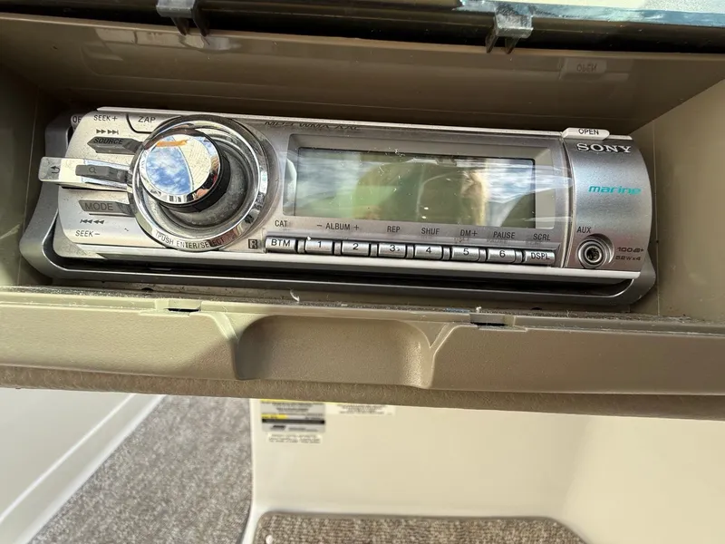 Slide: The Image of Sony marine stereo system in a 2012 Crownline 225 SS boat dashboard. - 17