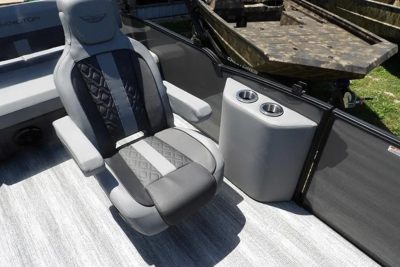 Slide: The Image of 2025 Bennington M Swingback 24 MSB boat interior with luxury seating and cup holders. - 29