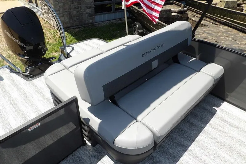 Slide: The Image of 2025 Bennington M Swingback 24 MSB boat with gray seating and Mercury engine. - 43