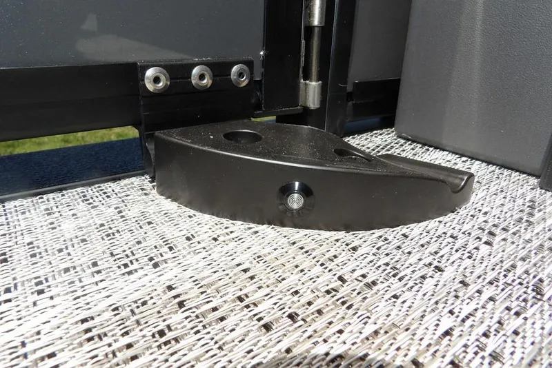 Slide: The Image of Close-up of a 2025 Bennington M Swingback 24 MSB boat hinge detail. - 50