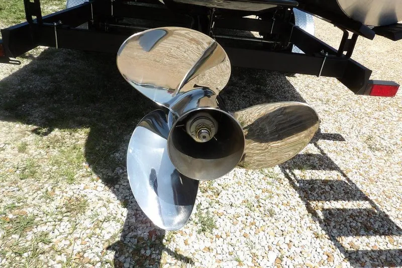 Slide: The Image of Propeller of 2025 Bennington M Swingback 24 MSB boat on trailer. - 8