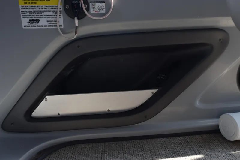 Slide: The Image of Control panel of 2020 Harris Solstice 230 boat with safety instructions. - 14