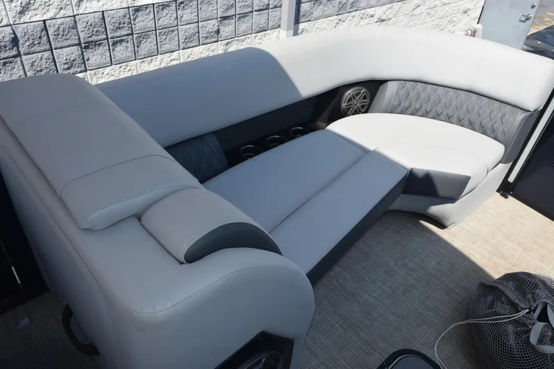 Slide: The Image of 2020 Harris Solstice 230 boat interior with luxurious gray seating and cup holders. - 18
