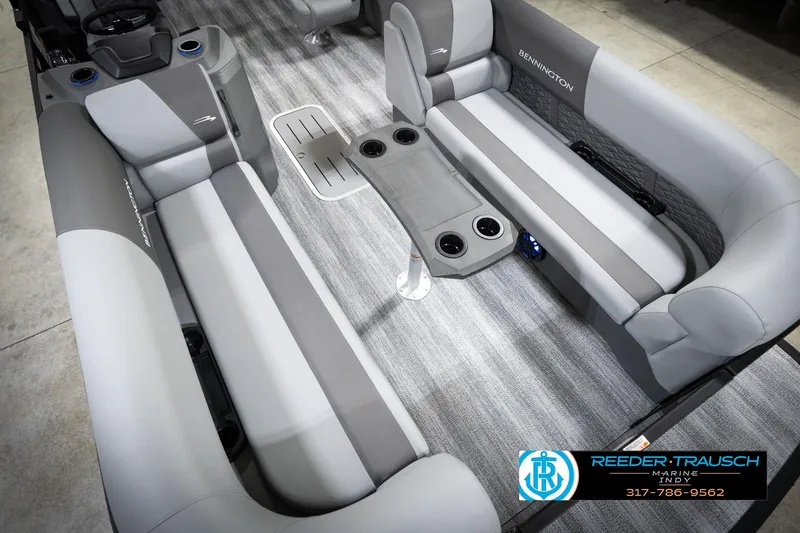 Slide: The Image of 2026 Bennington 21 SSR pontoon boat interior with gray seating and cup holders. - 13