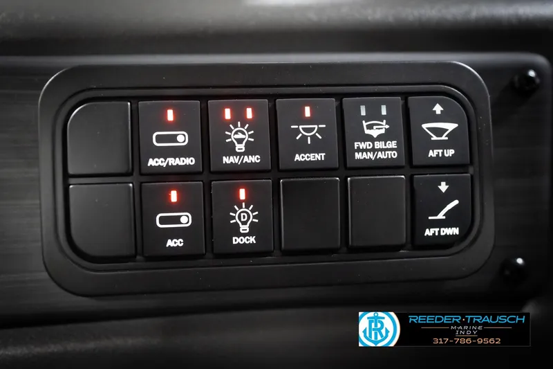 Slide: The Image of Control panel of 2026 Bennington 21 SSR boat with labeled switches and indicators. - 33